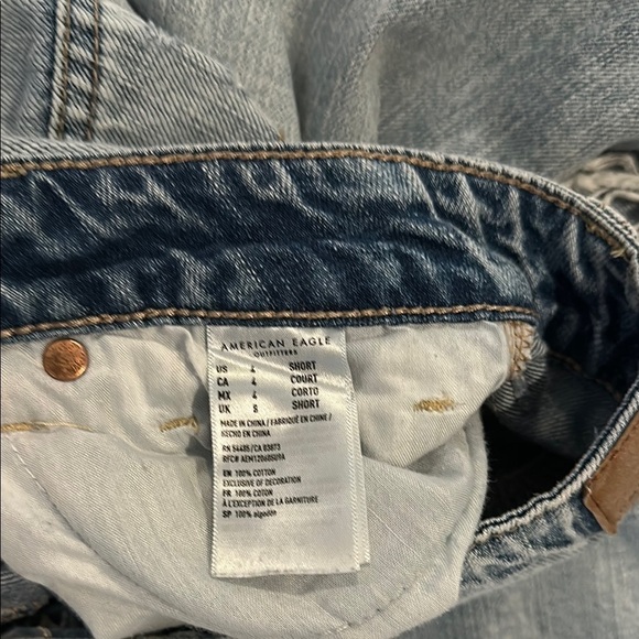 Women's Distressed Blue Jeans with Floral Embroidery - Picture 5 of 6